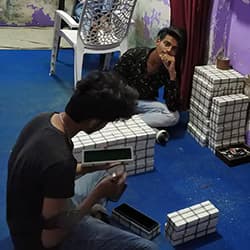 Bone made items are being finished by artisan.